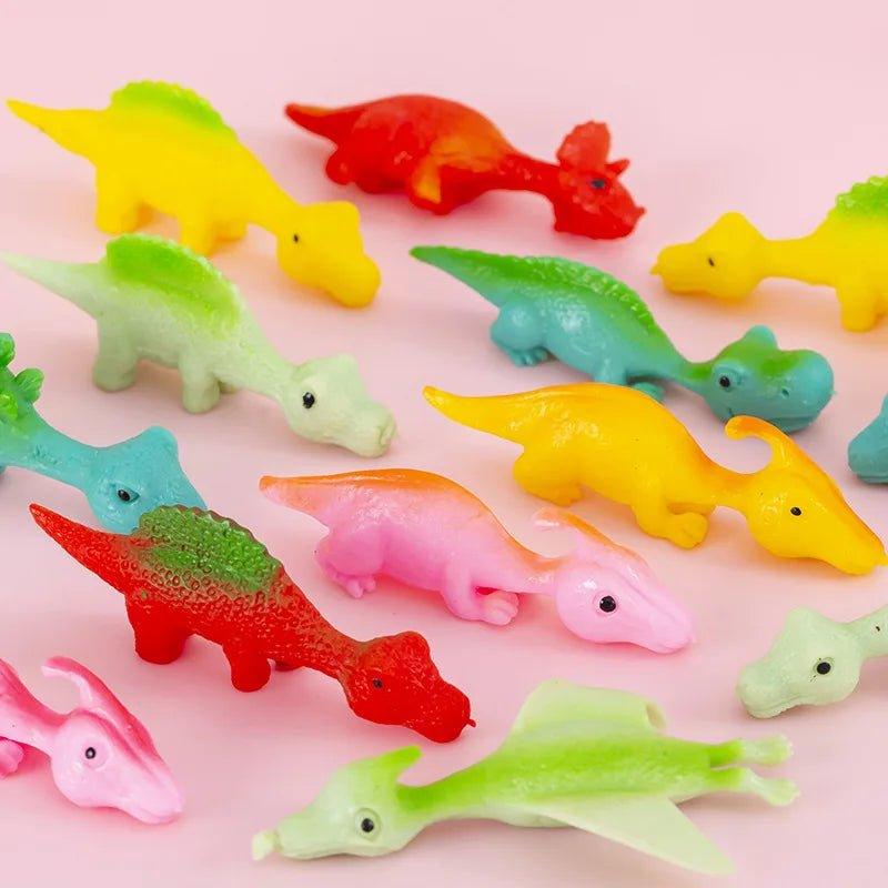 Dino Estilingue - Dinossauro que Gruda na Parede - Brinquedo Montessori #Product_type# - Desenvolvimento infantil